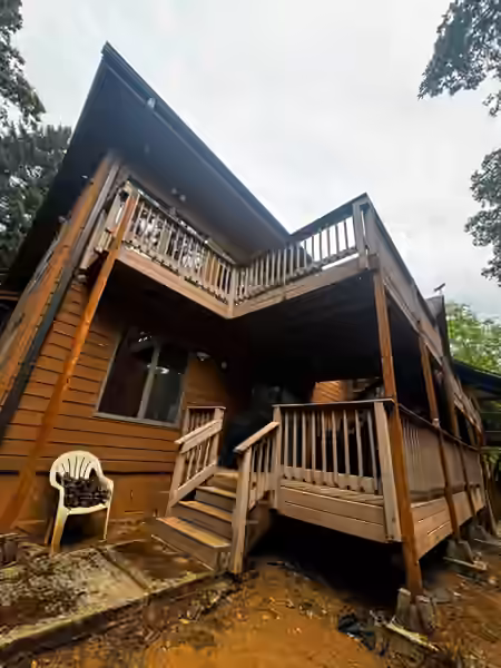 Before: weathered wood deck, ready for a rebuild