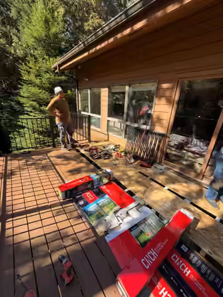 Crew laying new composite decking
